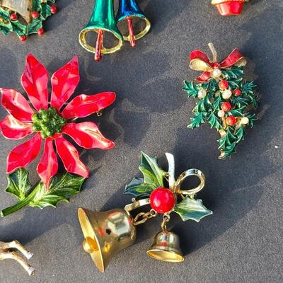 Lot 501: Vintage Holiday Brooches: Rudolph, Santa, Poinsettia and More