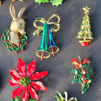 Lot 501: Vintage Holiday Brooches: Rudolph, Santa, Poinsettia and More