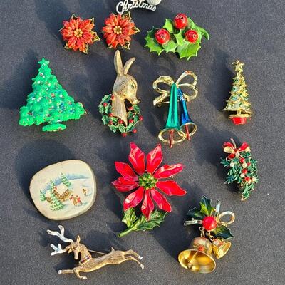 Lot 501: Vintage Holiday Brooches: Rudolph, Santa, Poinsettia and More