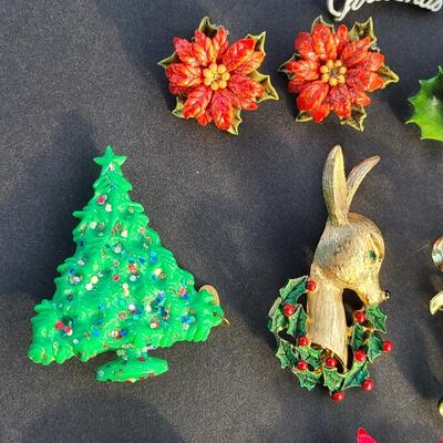 Lot 501: Vintage Holiday Brooches: Rudolph, Santa, Poinsettia and More