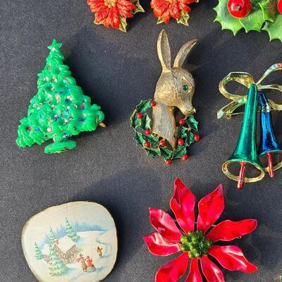 Lot 501: Vintage Holiday Brooches: Rudolph, Santa, Poinsettia and More