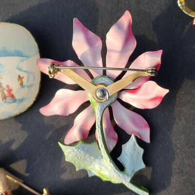 Lot 501: Vintage Holiday Brooches: Rudolph, Santa, Poinsettia and More