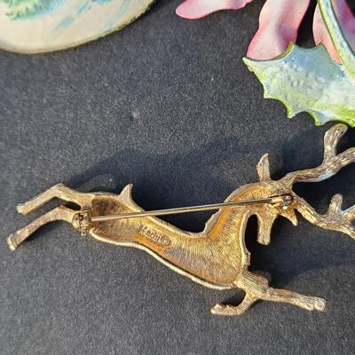 Lot 501: Vintage Holiday Brooches: Rudolph, Santa, Poinsettia and More