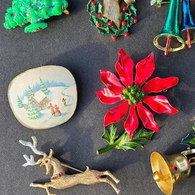 Lot 501: Vintage Holiday Brooches: Rudolph, Santa, Poinsettia and More