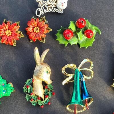 Lot 501: Vintage Holiday Brooches: Rudolph, Santa, Poinsettia and More