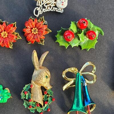 Lot 501: Vintage Holiday Brooches: Rudolph, Santa, Poinsettia and More