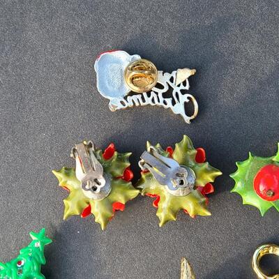 Lot 501: Vintage Holiday Brooches: Rudolph, Santa, Poinsettia and More