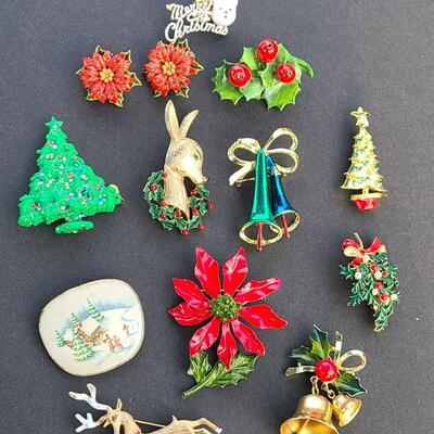 Lot 501: Vintage Holiday Brooches: Rudolph, Santa, Poinsettia and More
