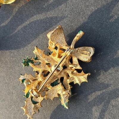 Lot 501: Vintage Holiday Brooches: Rudolph, Santa, Poinsettia and More