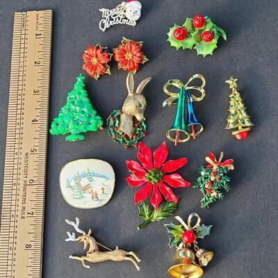 Lot 501: Vintage Holiday Brooches: Rudolph, Santa, Poinsettia and More