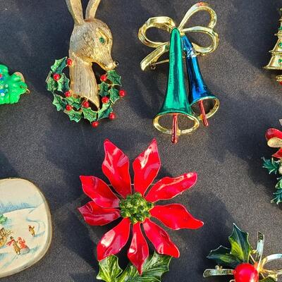 Lot 501: Vintage Holiday Brooches: Rudolph, Santa, Poinsettia and More
