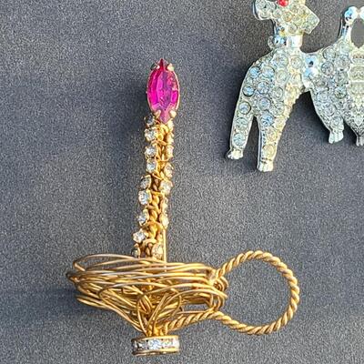 Lot 411: Vintage Rhinestone Poodle and Candlestick Brooches