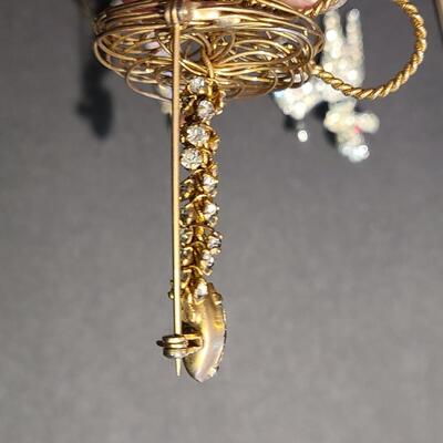 Lot 411: Vintage Rhinestone Poodle and Candlestick Brooches