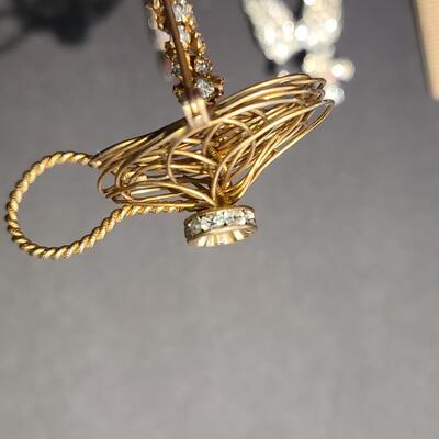 Lot 411: Vintage Rhinestone Poodle and Candlestick Brooches