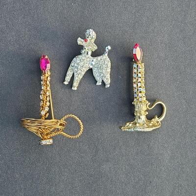 Lot 411: Vintage Rhinestone Poodle and Candlestick Brooches