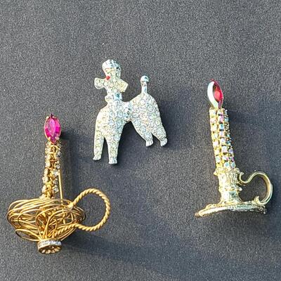 Lot 411: Vintage Rhinestone Poodle and Candlestick Brooches