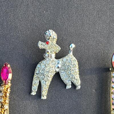 Lot 411: Vintage Rhinestone Poodle and Candlestick Brooches