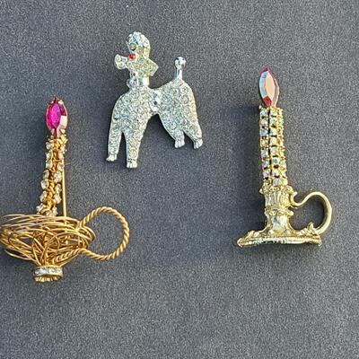 Lot 411: Vintage Rhinestone Poodle and Candlestick Brooches
