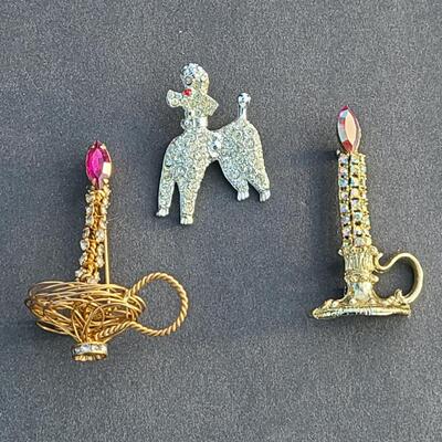 Lot 411: Vintage Rhinestone Poodle and Candlestick Brooches