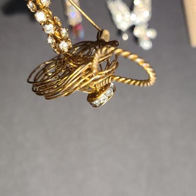Lot 411: Vintage Rhinestone Poodle and Candlestick Brooches