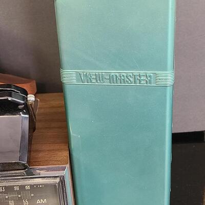 Lot 428: MCM Vintage GE Working Radio, Canon Camera and More