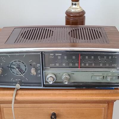 Lot 428: MCM Vintage GE Working Radio, Canon Camera and More