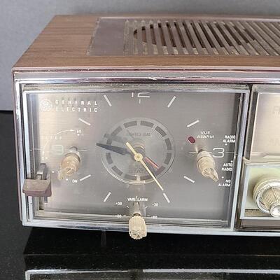 Lot 428: MCM Vintage GE Working Radio, Canon Camera and More