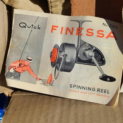 Lot 421: Vintage Fishing Supplies: Igloo Fishing Cooler, New Salt Water Reel and More