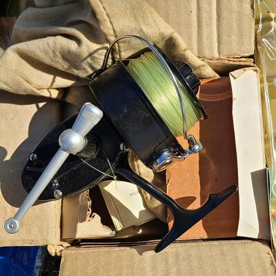 Lot 421: Vintage Fishing Supplies: Igloo Fishing Cooler, New Salt Water Reel and More