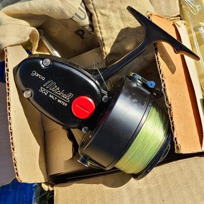 Lot 421: Vintage Fishing Supplies: Igloo Fishing Cooler, New Salt Water Reel and More