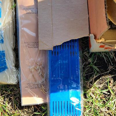 Lot 421: Vintage Fishing Supplies: Igloo Fishing Cooler, New Salt Water Reel and More