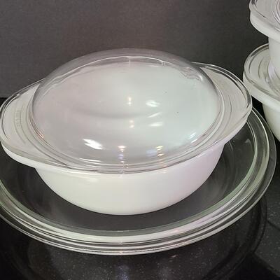 Lot 374: Pyrex Milk Glass  Covered Casseroles, Pie Plates and More