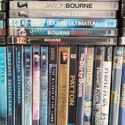 Lot 333: DVD Lot: Matrix Sets, Lord of the Rings, Bourne Sets, Mission Impossibles and More