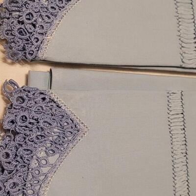Lot 132: Vintage Handmade Crochet Edge Blue Pillowcases, Eggshell Pillowcases (was tape residue) and (2) White Full Flat Sheet