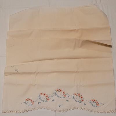 Lot 137: Mixed Linens - Cross Stitched Pillowcase (1), White Macrame Pieces (4) and Quilted Pillowcase (1)