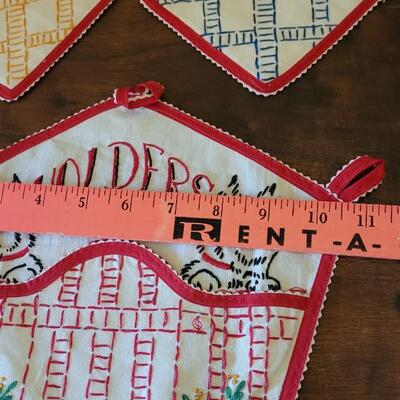 Lot 151: Vintage Needle Work Hot Pads and Holder
