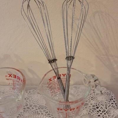 Lot 178: Contemporary Rossville, Ohio Pie Plate, Glass Juicer, Measuring Cups, Kitchen Utensils and Vintage Cookie Cutters