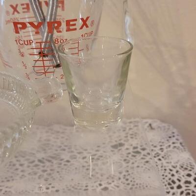 Lot 178: Contemporary Rossville, Ohio Pie Plate, Glass Juicer, Measuring Cups, Kitchen Utensils and Vintage Cookie Cutters