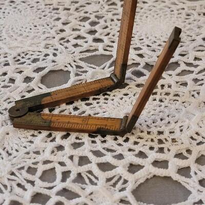 Lot 182: Antique Wood Pointer, Multi Fold Ruler and Sliding Ruler