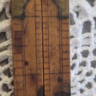 Lot 182: Antique Wood Pointer, Multi Fold Ruler and Sliding Ruler