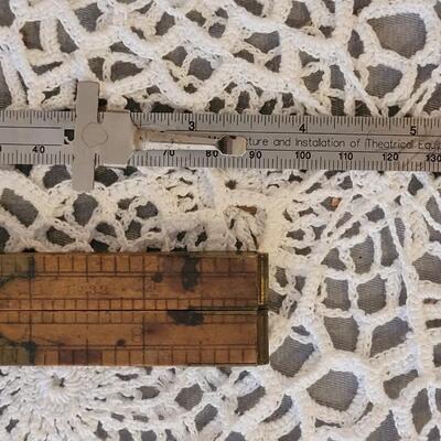 Lot 182: Antique Wood Pointer, Multi Fold Ruler and Sliding Ruler
