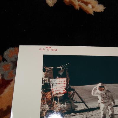 Photograph of Nasa Astronaut Walking on Planet