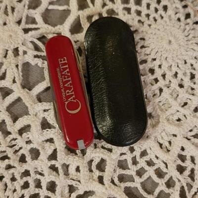 Lot 186: Vintage Flashlights, Bungee Tie Downs  and small Swiss Army Knife