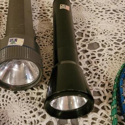 Lot 186: Vintage Flashlights, Bungee Tie Downs  and small Swiss Army Knife