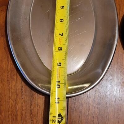 Lot 194: Stainless Platters Serving Bowls and Accordian Hot Pad