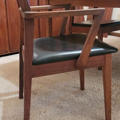 Lot 203: Mid Century Modern FOUNDERS American Walnut Dining Table with 2 Leaves and 4 Black Leather Seat Cane Back Chairs