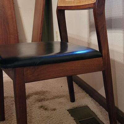 Lot 203: Mid Century Modern FOUNDERS American Walnut Dining Table with 2 Leaves and 4 Black Leather Seat Cane Back Chairs
