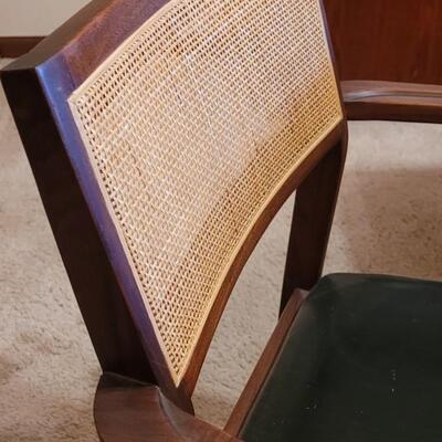 Lot 203: Mid Century Modern FOUNDERS American Walnut Dining Table with 2 Leaves and 4 Black Leather Seat Cane Back Chairs