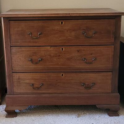 Lot 215: Transition Walnut Chippendale Dresser