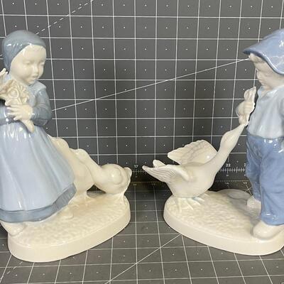 Porcelain Statue Boy and a Girl 
